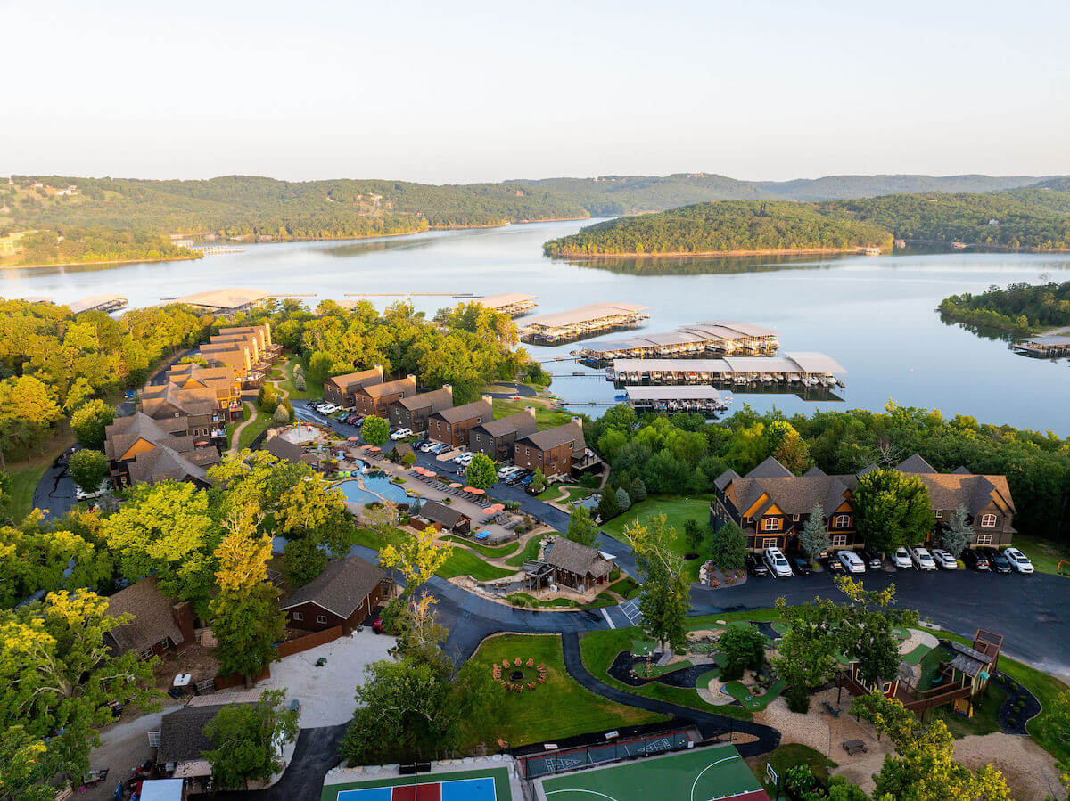 Aerial view of WaterMill Cove, its pools, homes, marina and Table Rock Lake